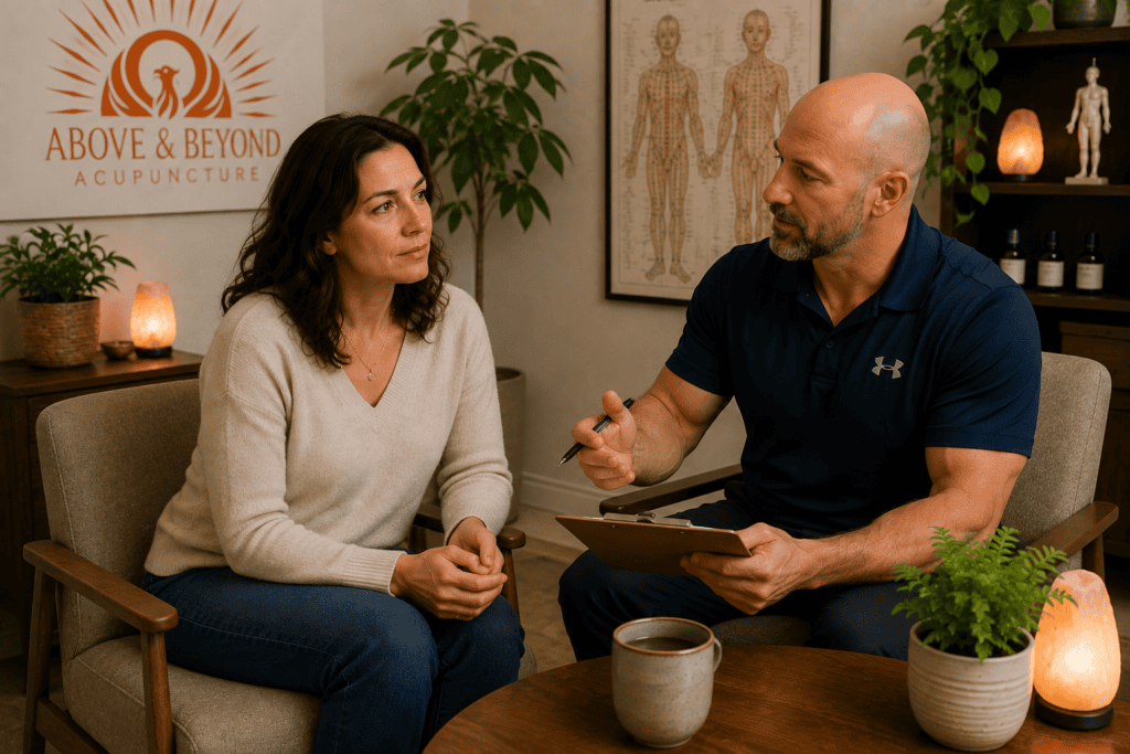 Licensed acupuncturist and patient talking during a calm consultation about whether acupuncture is a good fit.