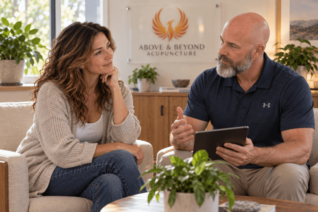 Patient and acupuncturist discussing persistent sleep problems and an individualized treatment plan.