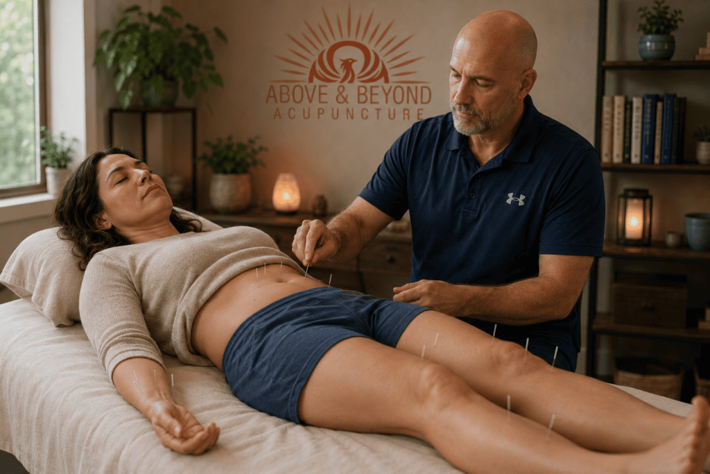 Woman receiving acupuncture treatment for digestive symptoms associated with chronic stress.