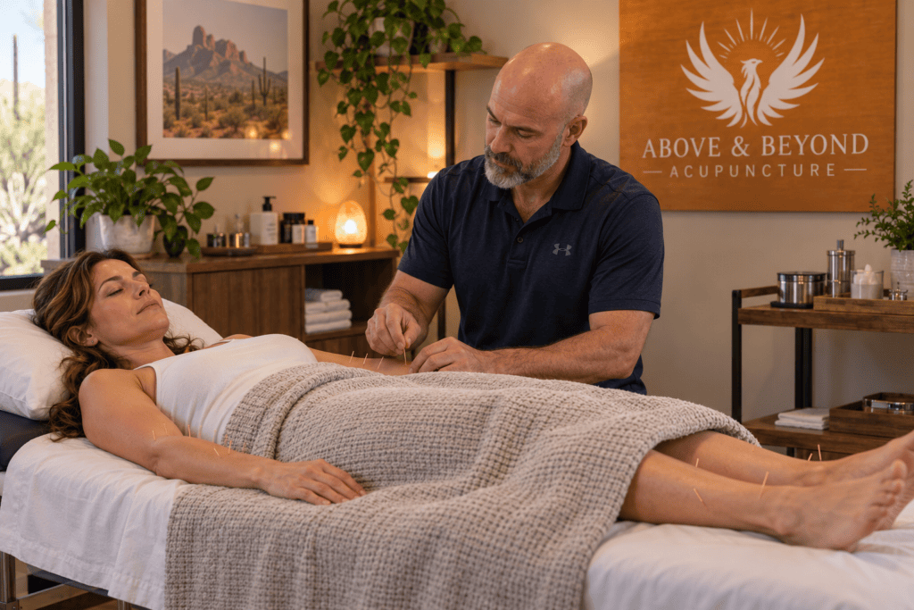 Woman receiving acupuncture as part of an individualized approach to recurring acid reflux.